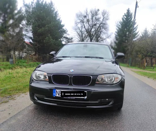 samochody osobowe BMW Seria 1 cena 16500 przebieg: 304000, rok produkcji 2010 z Frombork